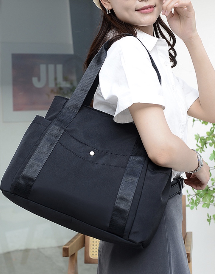 COACH レディーストートバッグ（色：イエロー系）｜バッグ